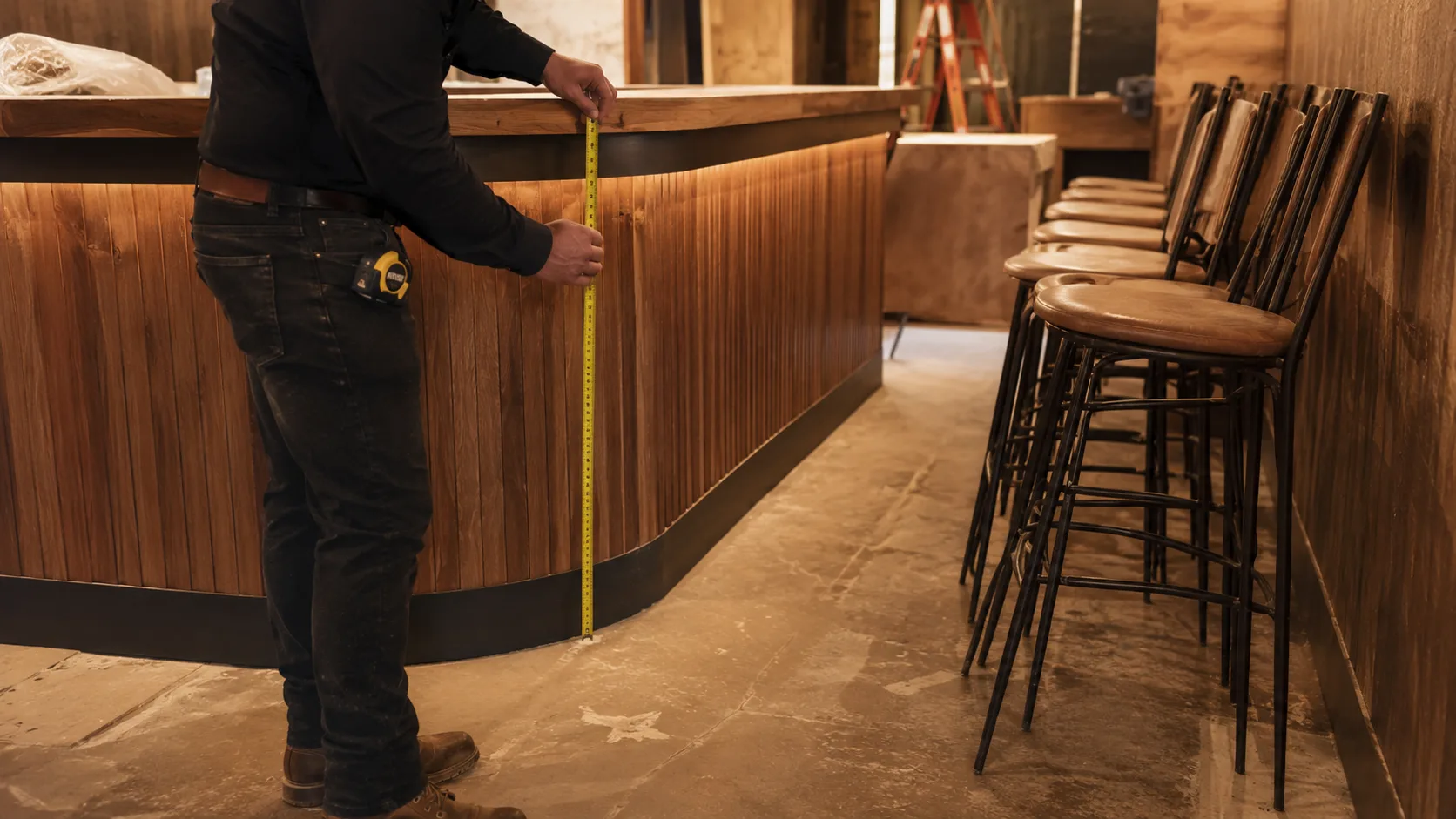 Barstool counter installation measurement showing final placement verification