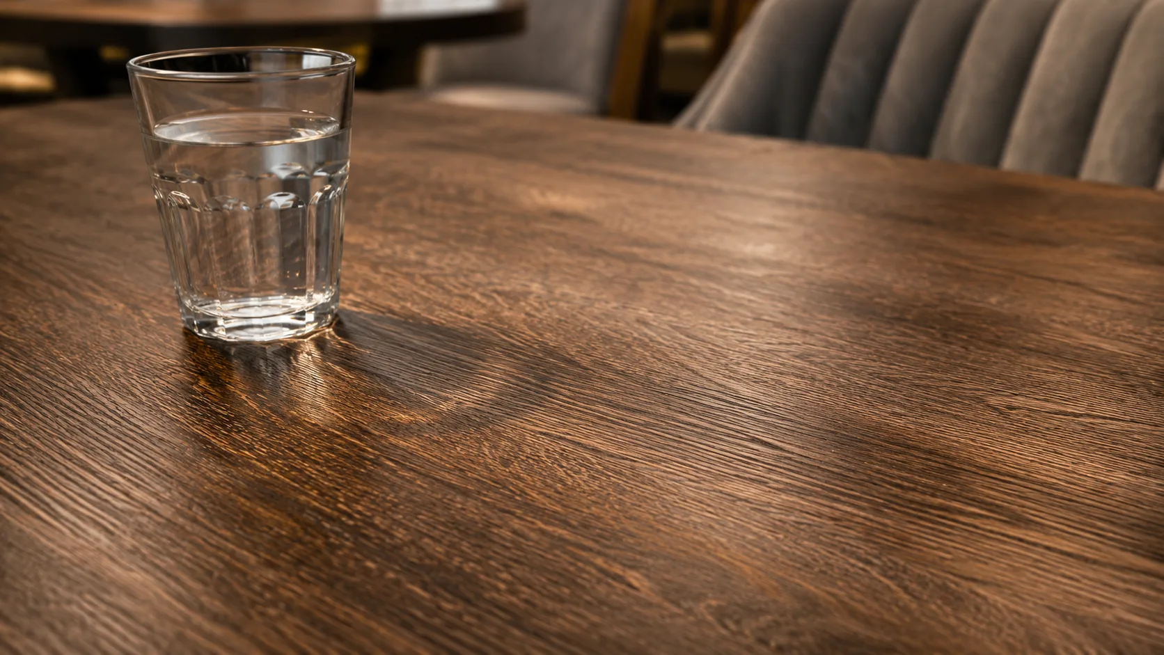 Commercial dining table surface quality showing laminate top close-up