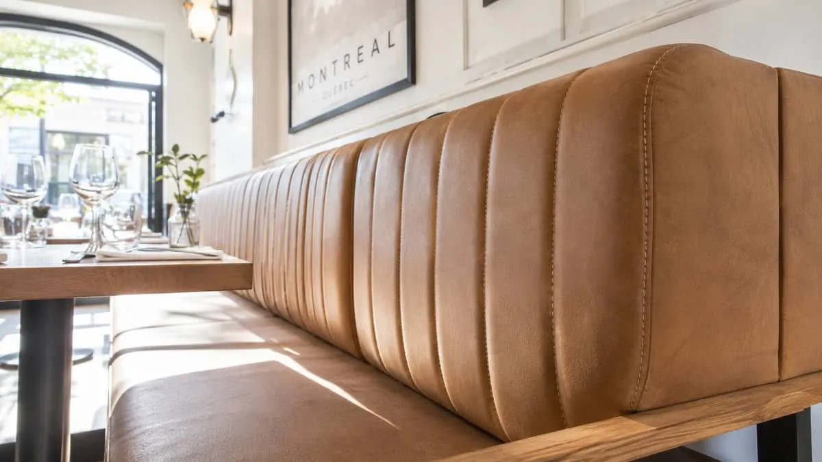 close-up of contract-grade restaurant seating detail, showing quality upholstery, solid frame construction, and commerci