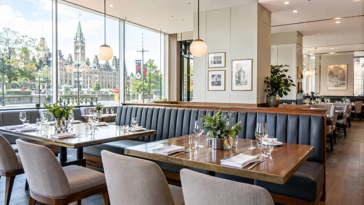 a restaurant dining room in an Ottawa neighbourhood setting, showing contract booth seating and dining chairs that balan