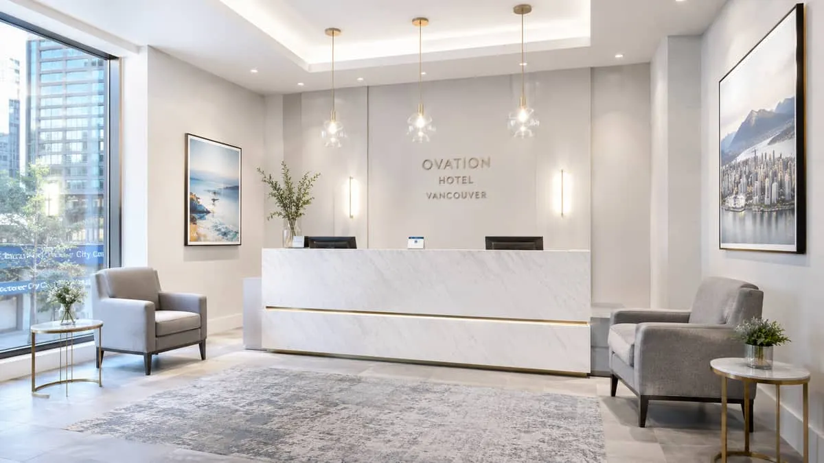 reception area chairs flanking a hotel front desk in a modern Vancouver boutique hotel, chairs in a muted upholstery ton