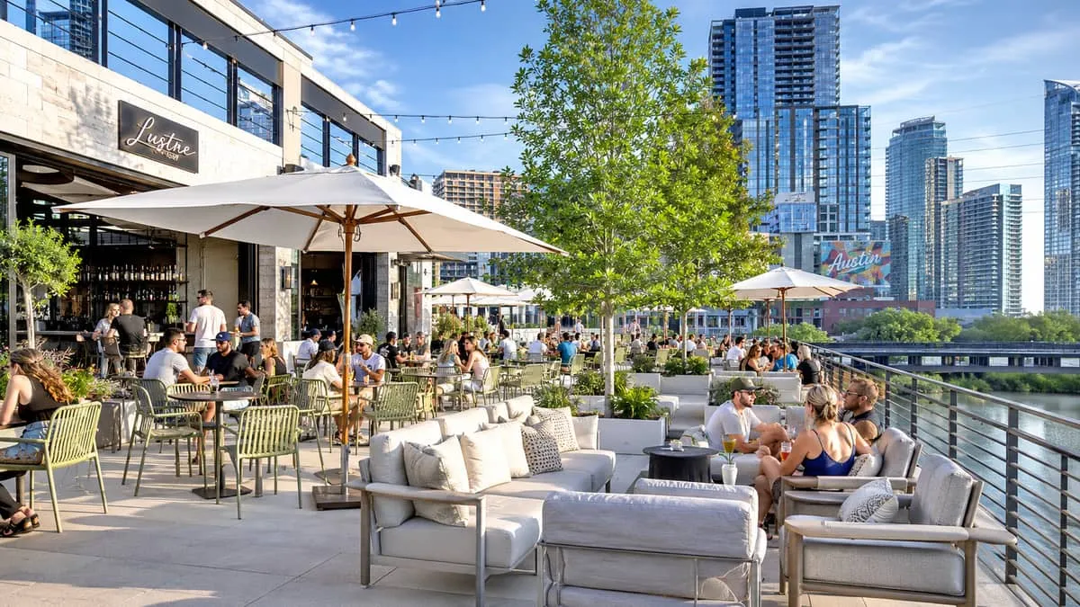 Commercial patio picnic tables installed at an outdoor venue