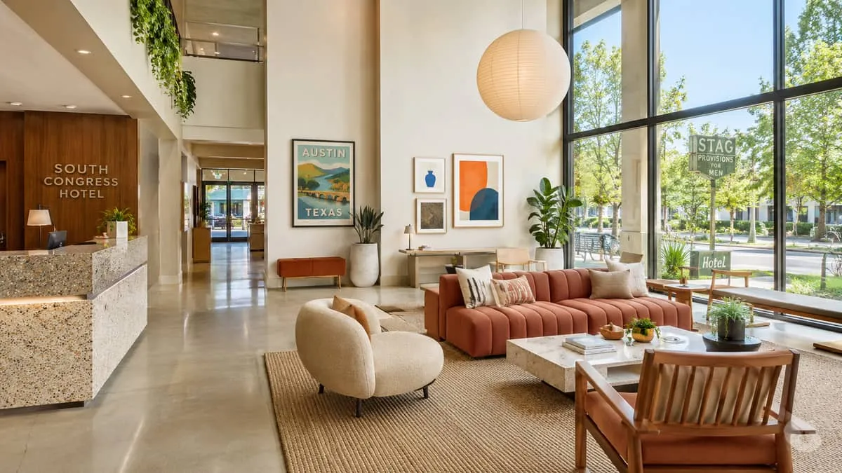 Hotel lobby seating and casegoods in a downtown St. Louis property showing contract-grade common area furniture