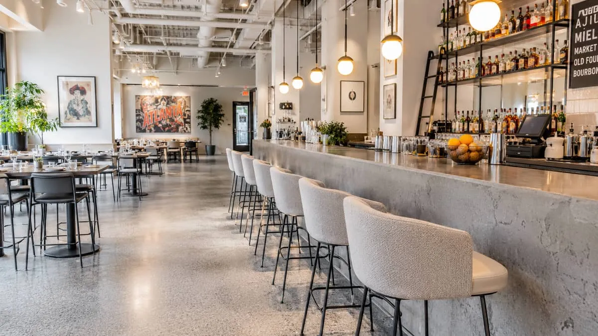 Restaurant table and base specifications for a Billings venue showing cast-iron pedestal base with commercial laminate top