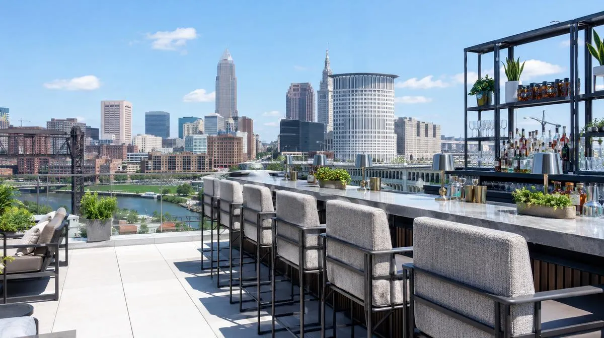 Old Town Wichita rooftop bar seating with powder-coated aluminum barstools and solution-dyed acrylic upholstery arranged for patio use