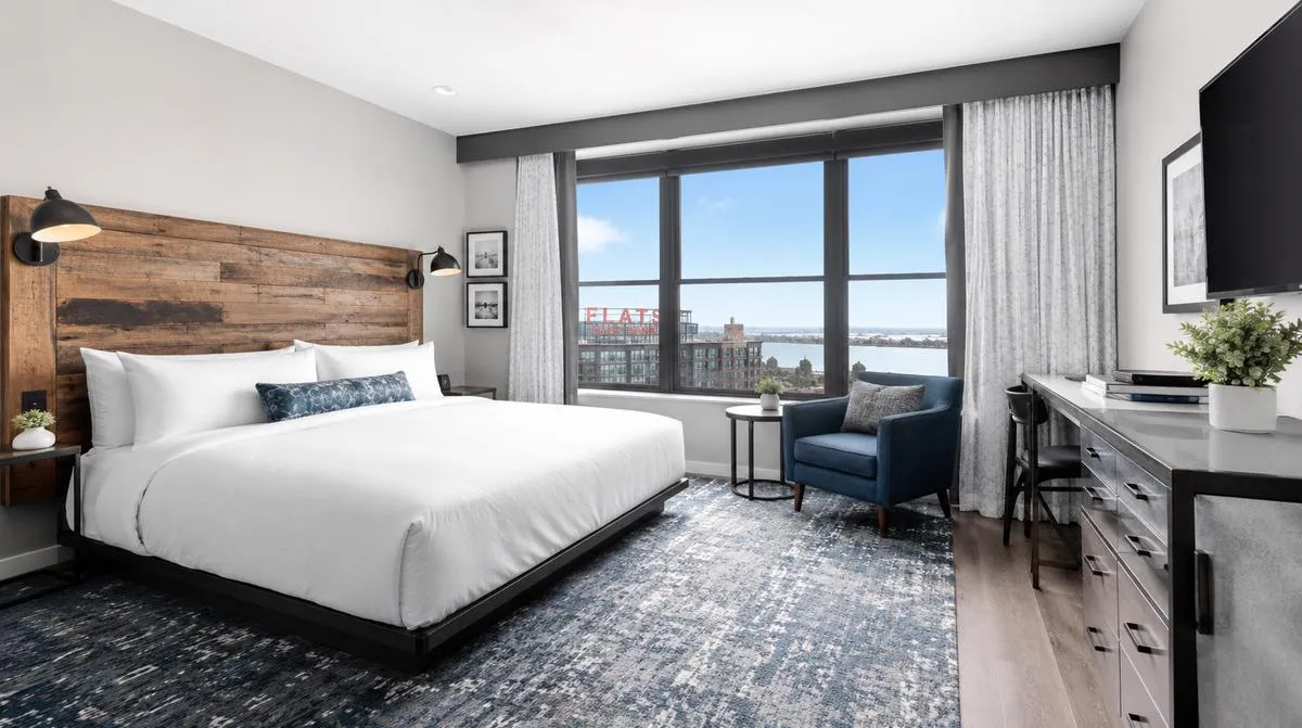 Boutique hotel furniture in a Little Rock River Market District property showing contract-grade lounge seating in a converted warehouse lobby