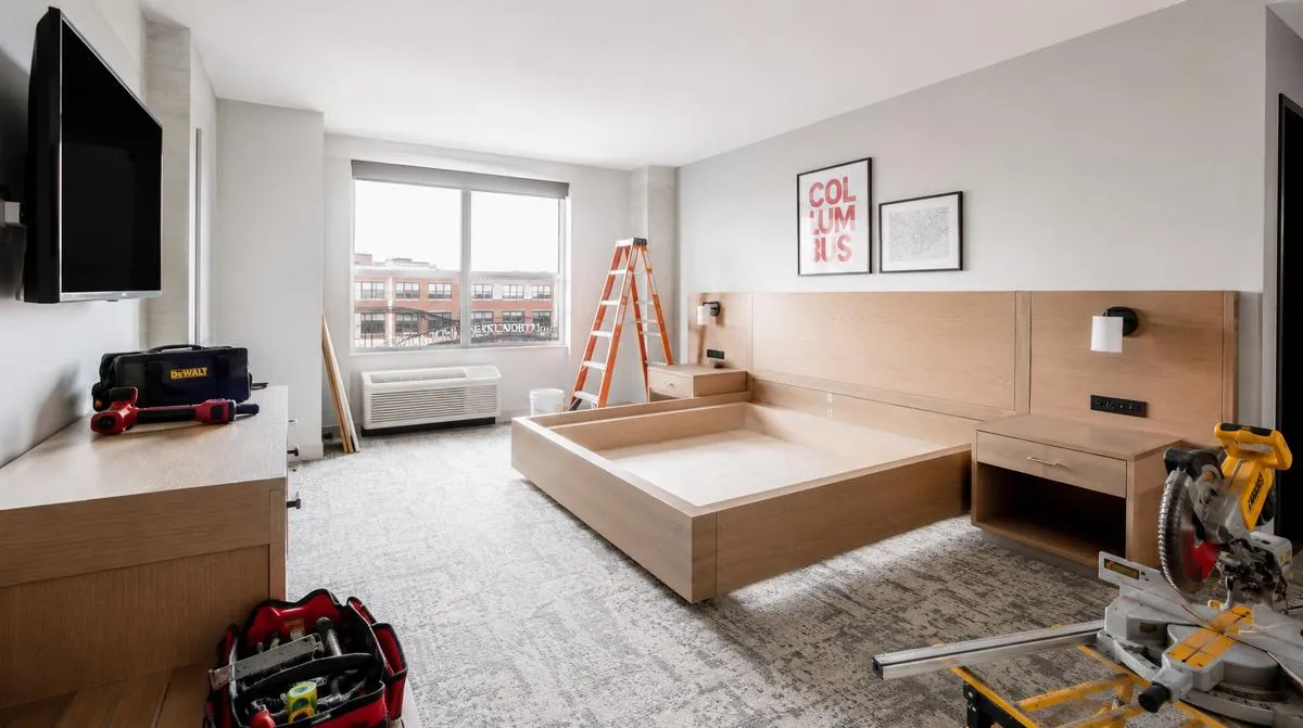 Hotel renovation furniture staged by floor in an occupied Wichita property showing phased FF&E delivery coordination